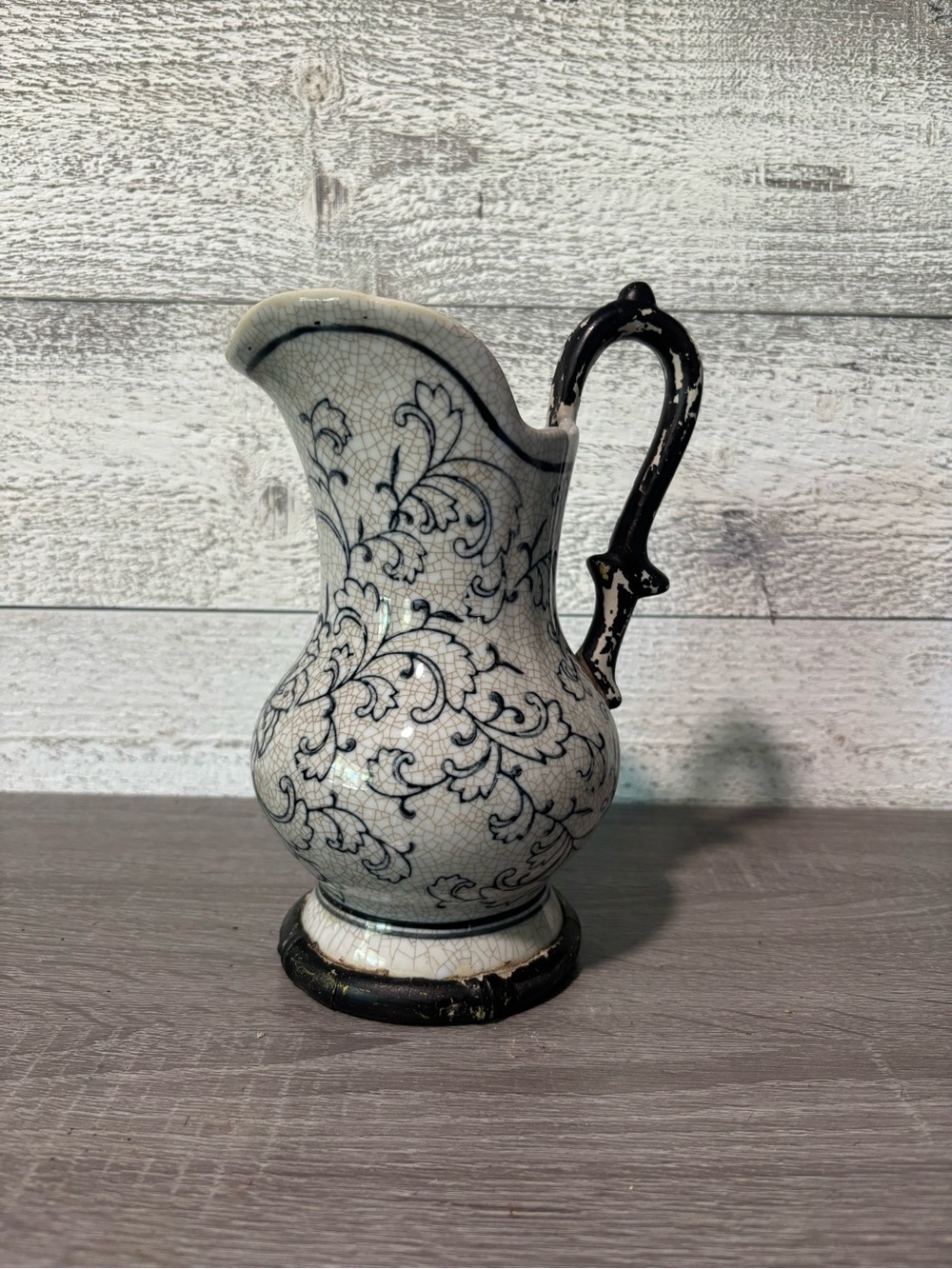 Decorative Ceramic Pitcher with Black Vine Motif